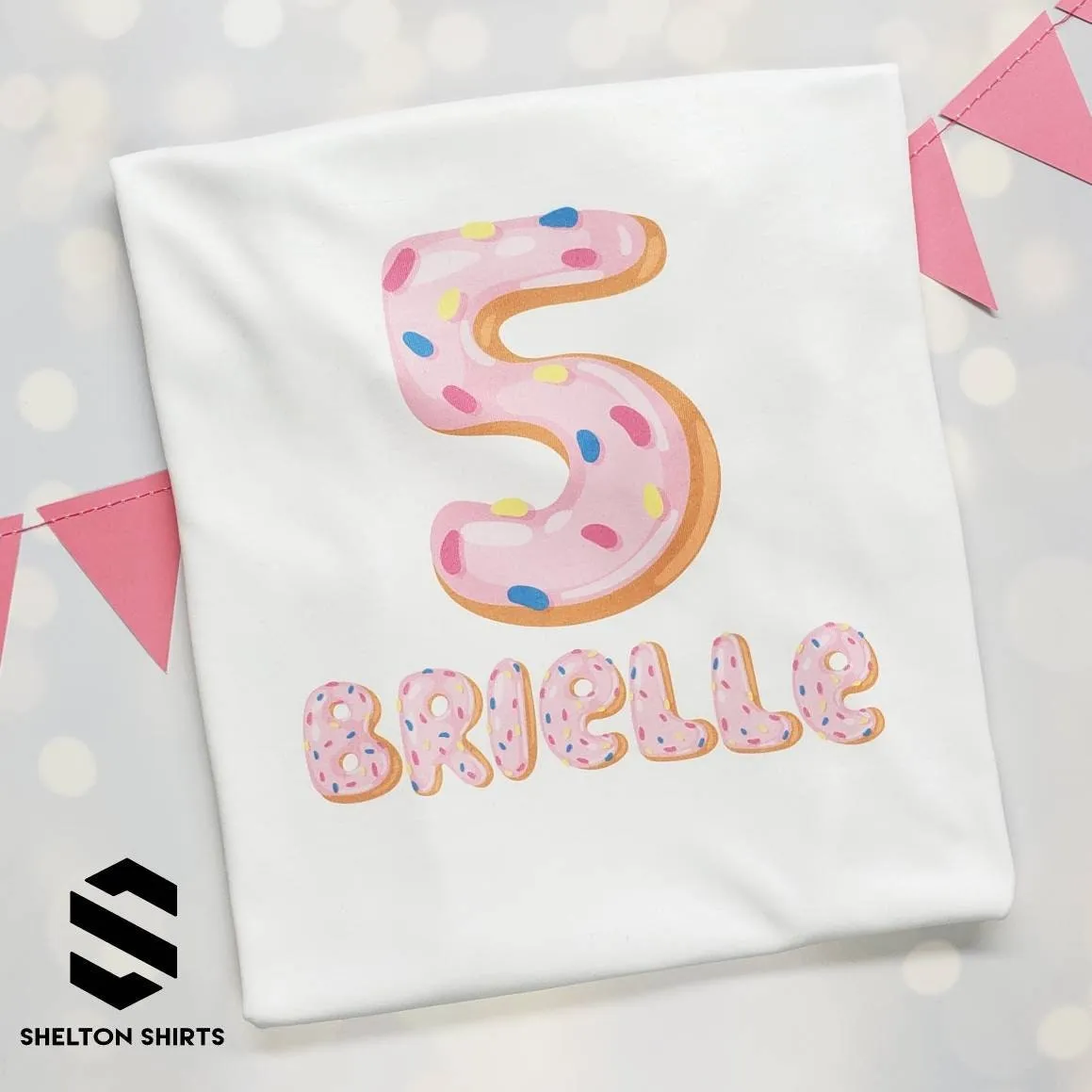 Pink Donut Birthday Shirt with Printed Frosted Number and Sprinkle Name